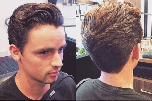kammade back curly hairstyle for men