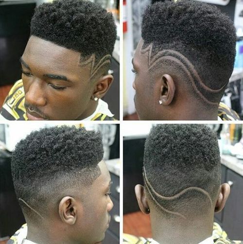 hög top fade with shaved designs