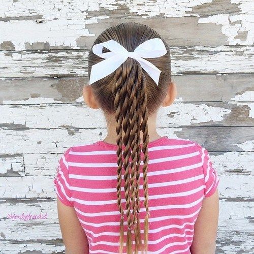 toddler girl ponytail hairstyle with twists