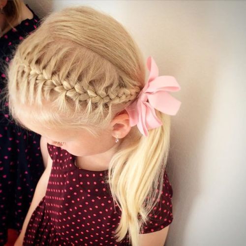 sida ponytail and a braid hairstyle for girls