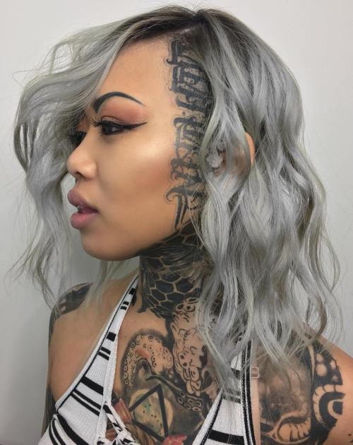 Mediu Wavy Gray Hairstyle With Head Tattoo