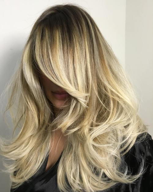 dolga Blonde Layered Hairstyle With Roots Fade