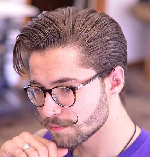 sleeked back medium hairstyle and hipster moustache 