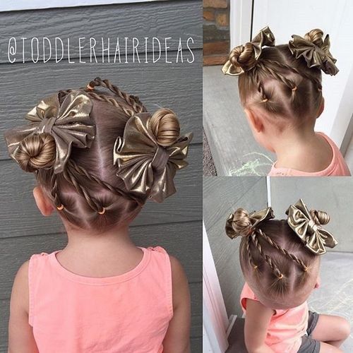 söt little girls hairstyle with twists and buns