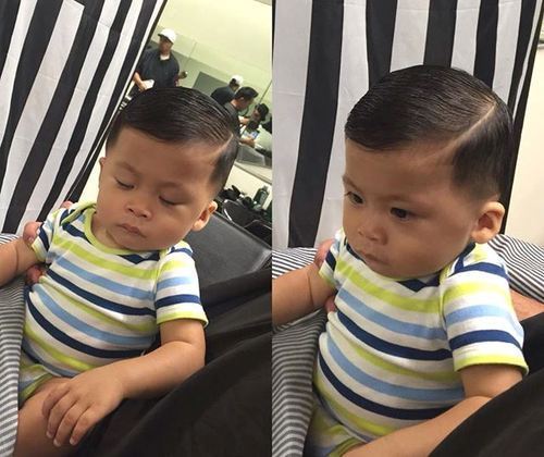 malo boy's sleek side-parted hairstyle