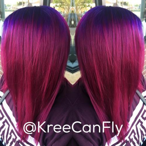 Layered Magenta Hairstyle With Blue Roots