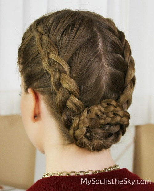 centrum-parted braided updo with a bun