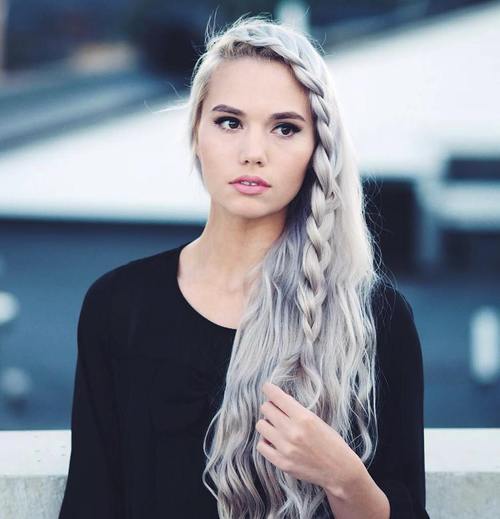 lung side-swept hairstyle with a side braid