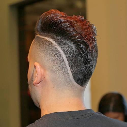mohawk fade with shaved lines for men