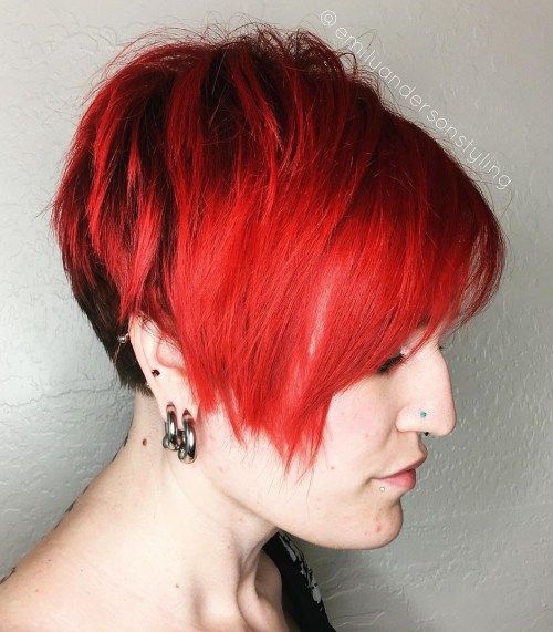 svetlo red asymmetrical pixie with side bangs