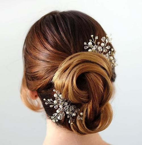 увијено bridal updo with beaded hair pieces