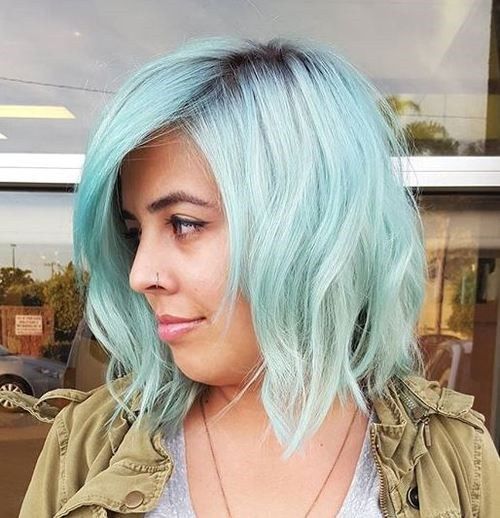 pastell blue hair with dark roots