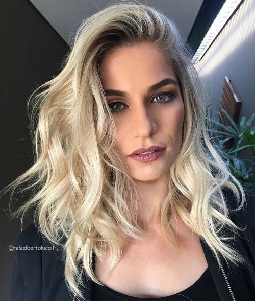 Mid-Length Tousled Blonde Hairstyle