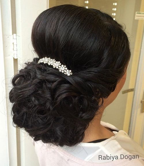 kučeravý wedding updo with a bouffant for thick hair