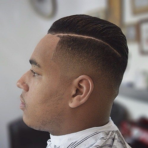 Črna side parted fade haircut