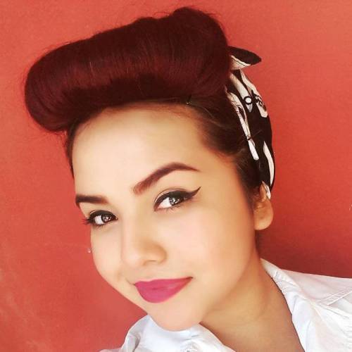 brunett pin up hairstyle with a scarf