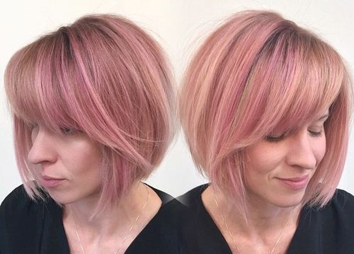 pastel pink bob with darkened roots