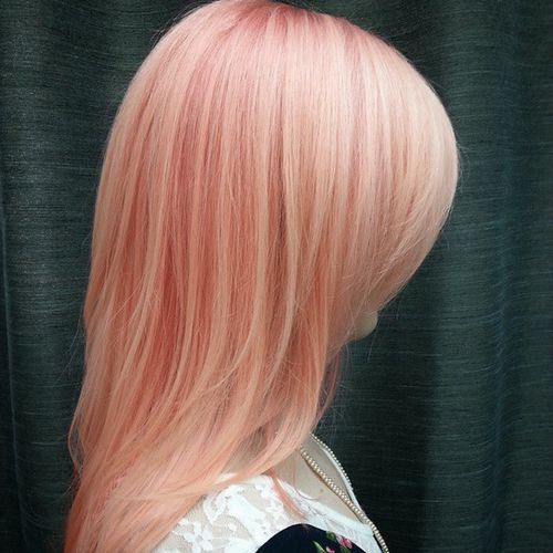 pastel peachy pink hair with lowlights