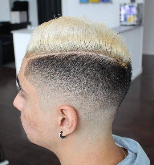 män's black and blonde side part fade
