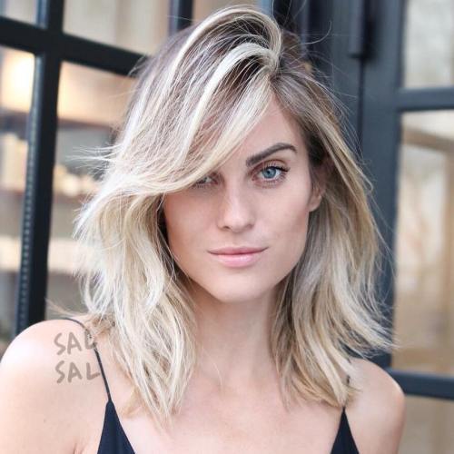 Medium Layered Hairstyle With Side Bangs