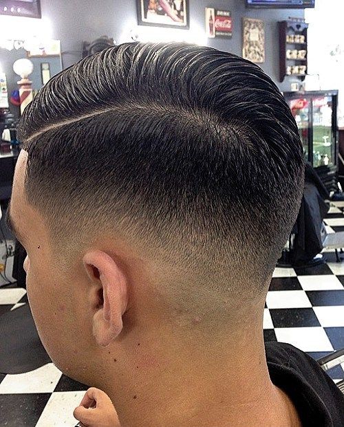 muži's side part hairstyle with fade