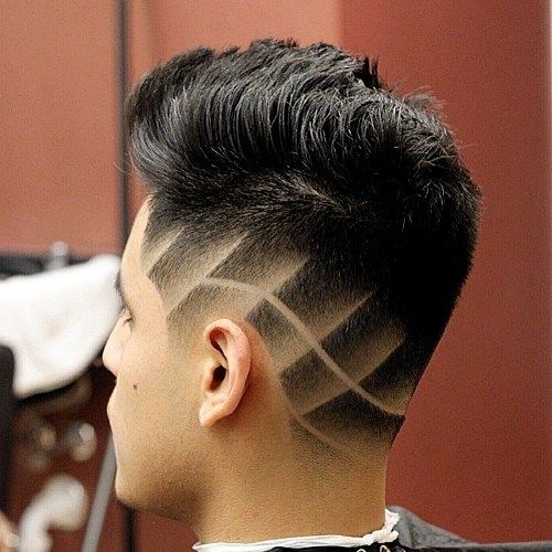 skosená haircut with shaved designs