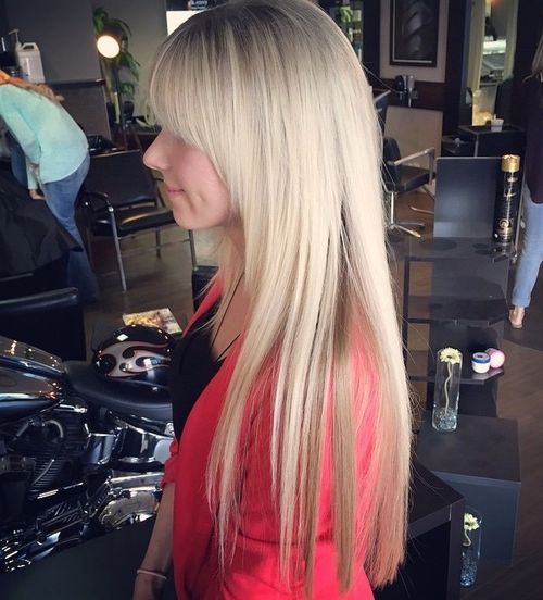 lång layered haircut with arched bangs
