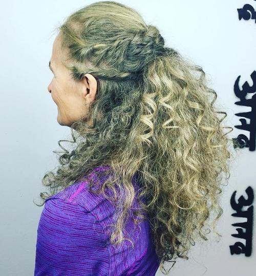 äldre women's half updo for long curly hair