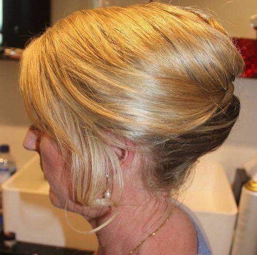 formalno french knot updo for older women
