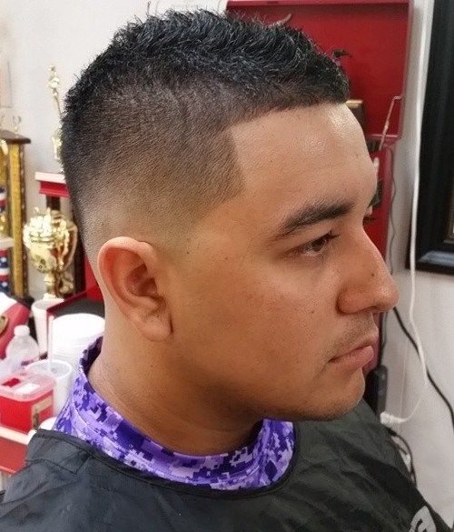 kort Mohawk into fade haircut