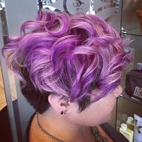 mic de statura undercut hairstyle with pastel purple top