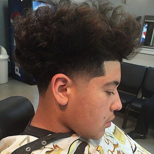 lång curly top tapered haircut for men