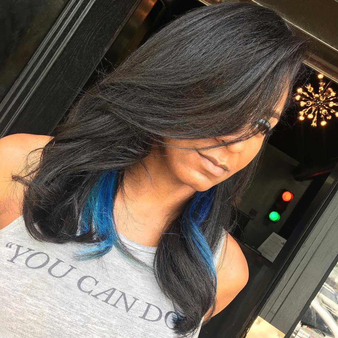 medium black hairstyle with blue highlights