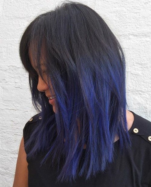 srednje layered black hair with blue highlights