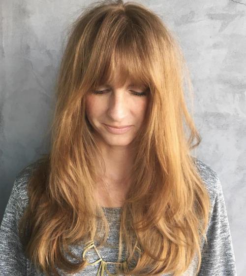 Lung Strawberry Blonde Hairstyle With Bangs