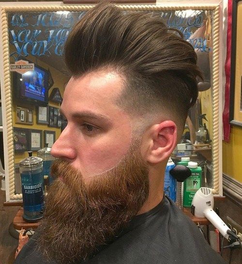 lång top short sides hairstyle with beard