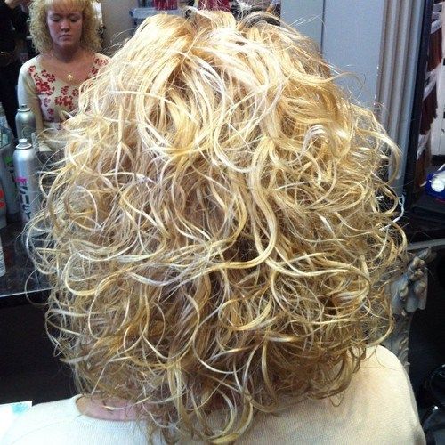 medium blonde perm hairstyle