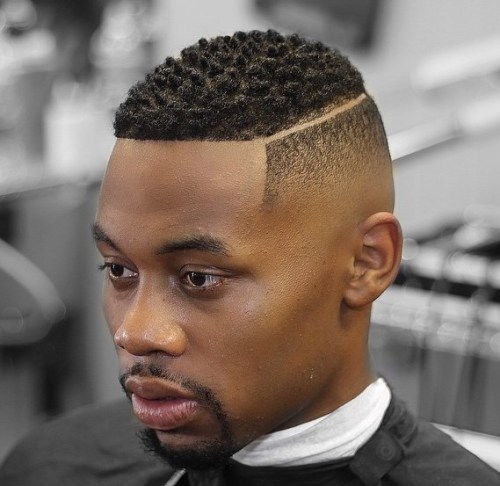 misto fade haircut for black men with a shaved part
