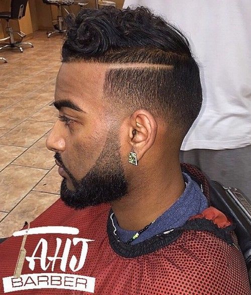 decolorare haircut for black men with a shaved part line