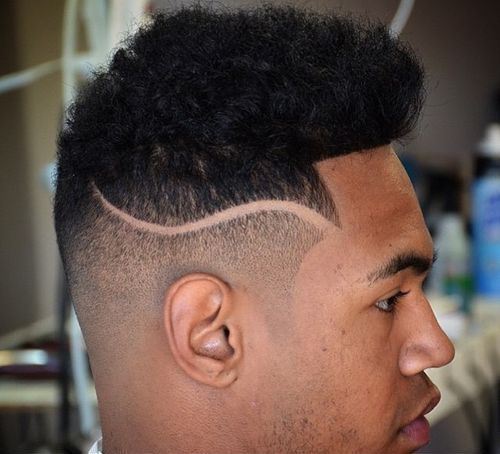 înalt fade haircut for black men with a shaved wave