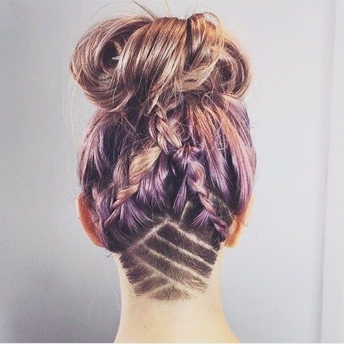 rörig braids and bun hairstyle with shaved nape design