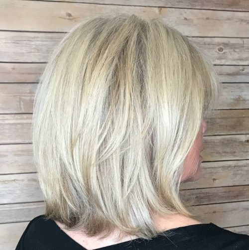60+ Medium Layered Ash Blonde Hairstyle