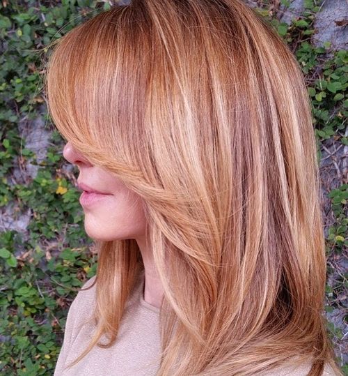 stratificat strawberry blonde hair with highlights
