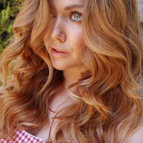 lung layered curly copper blonde hairstyle