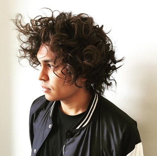rufsig curly men's hairstyle