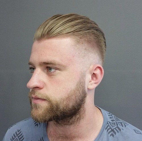 lång top short sides men's hairstyle with a beard