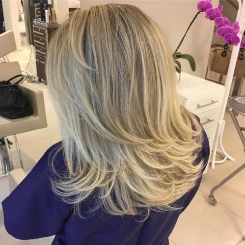 Mid-Length-To-Long Layered Ash Blonde Cut