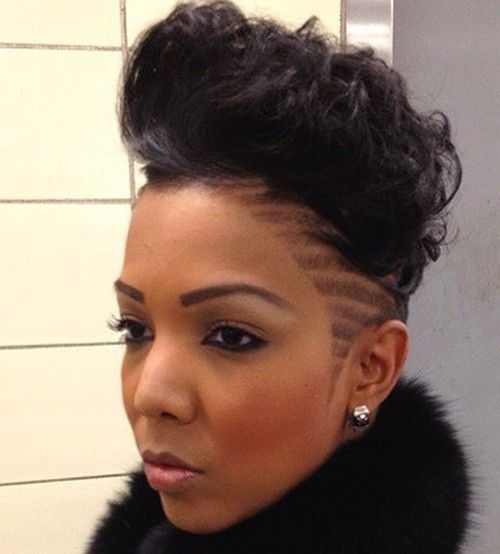 negru curly mohawk with side shaven designs