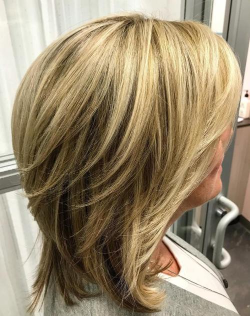 Axel Length Layered Blonde Hairstyle