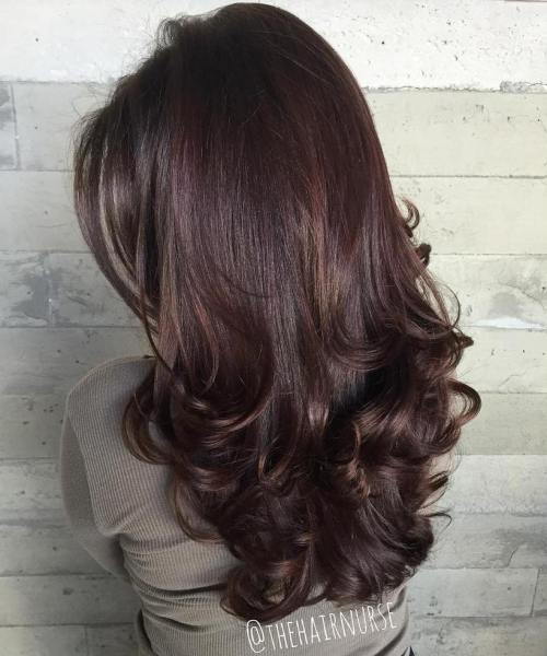 dolga Curled Brunette Hairstyle With Layers